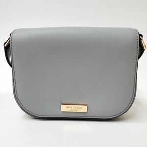 Kate Spade Blue and Gold Crossbody Bag with Sleek Design